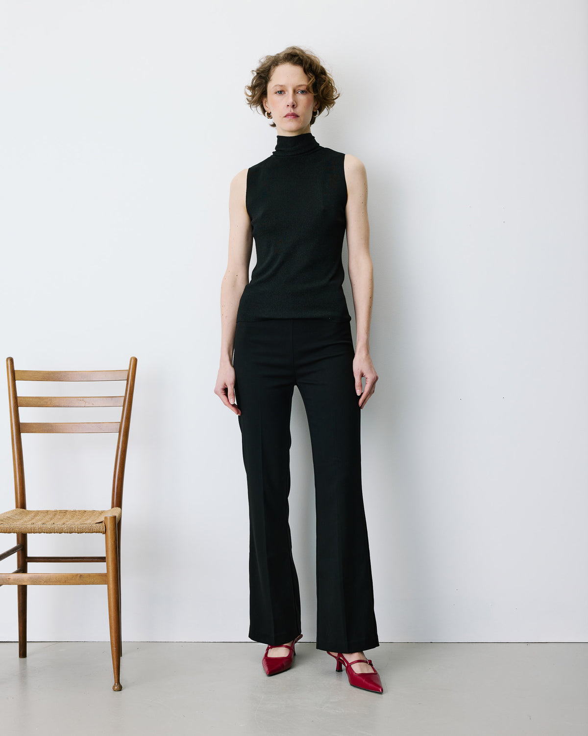 Top sin mangas con cuello alto noir Bailey