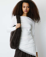 Top asymétrique manches longues bas en dentelle ivoire Bina