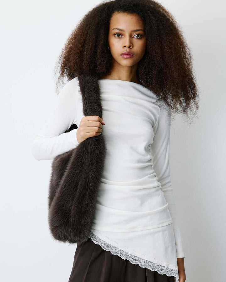 Top asymétrique manches longues bas en dentelle ivoire Bina