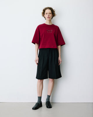 Camiseta con mensaje de lentejuelas cherry Bond