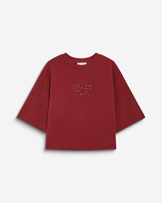 Camiseta con mensaje de lentejuelas cherry Bond