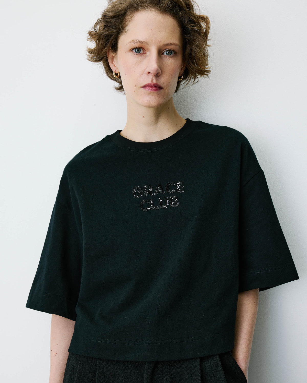 Camiseta con mensaje de lentejuelas noir Bond