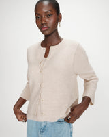 Cardigan en maille texturée sans manches beige Vollando
