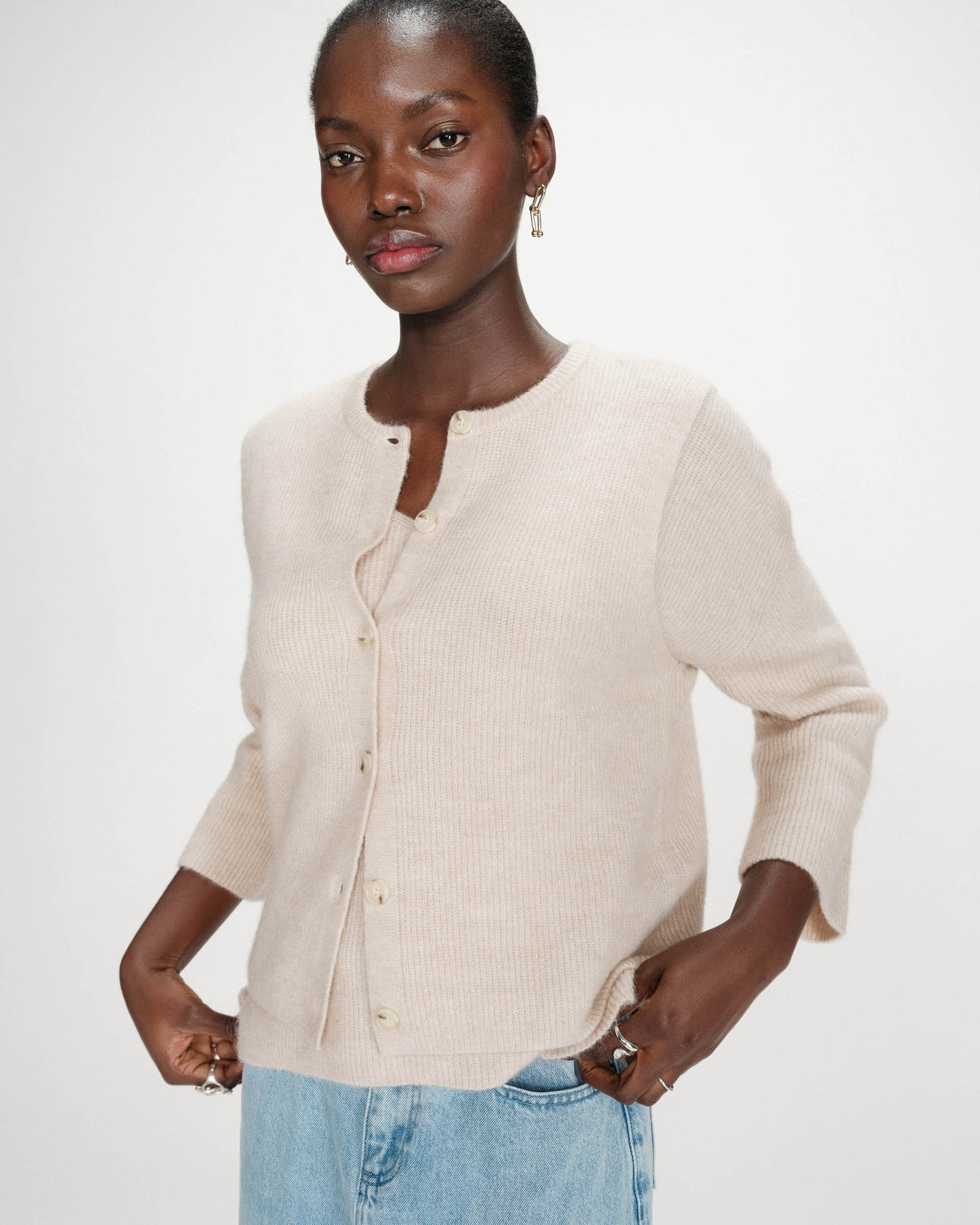 Cardigan en maille texturée sans manches beige Vollando