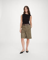 Top drapé asymétrique près du corps noir Vodia